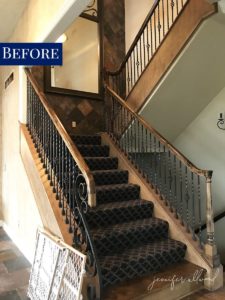dark brown stair carpet with traditional spindles