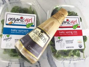 spinach, spring mix, and salad dressing